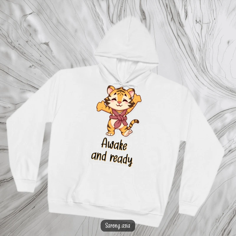 Funny hoodie featuring a playful tiger in a sarong, stretching, offering warmth and a humorous, powerful feel.